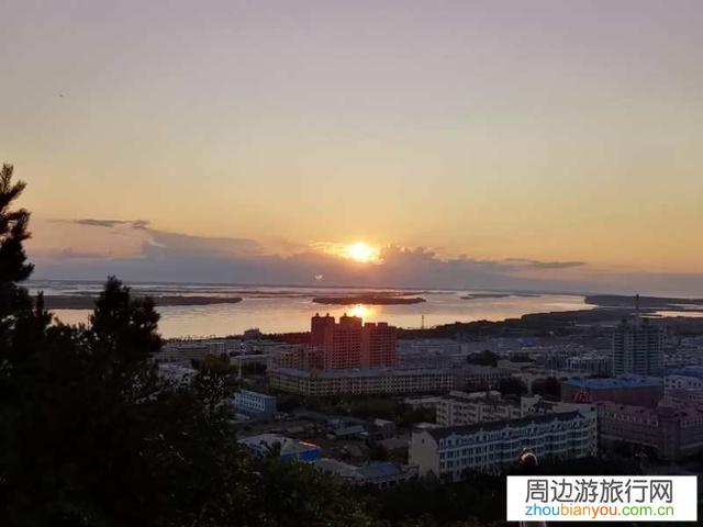 能分享一下你拍摄的美丽日出照片和你当时的拍摄感悟吗?