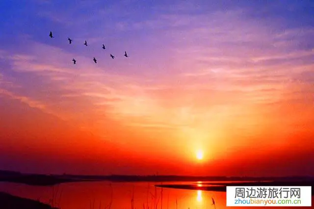 想到辽宁省海边去看日出，请推荐哪里好看？